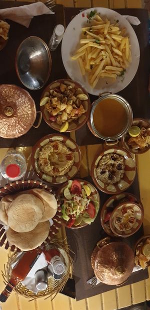 Lentil soup, hummus, tamenya & Tahini, babaganoush, chips, spicy potatoes at Al Sahaby Lane in Luxor