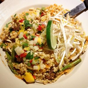 The 'Kingston 12' (vegan option, with tempeh, and as hot as possible): Israeli couscous, red coconut curry, grilled asparagus, jicama-mango salsa, almonds, mung bean sprouts ... at Nine Mile Montford in Asheville