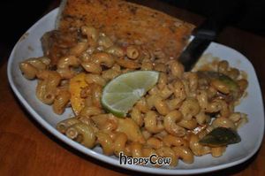 Raggy Road: Cajun Tofu with sauteed red, gold, & green peppers, squash & zucchini in a white wine creamy, dairy-free, coconut chipotle sauce. at Nine Mile Montford in Asheville