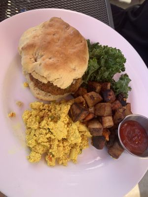 Chicken biscuit with tofu and potatoes on the side at Cafe Sunflower in Atlanta