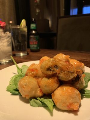 Brussels sprouts appetizer: Tempura batter fried with sweet & sour sauce. Nice way to serve sprouts. Great as appetizer   at Cafe Sunflower in Atlanta