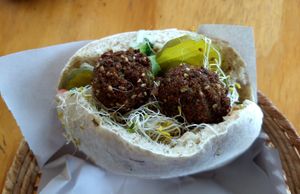 Falafel with hummus, sprouts, pickled chiles and cucumbers and more at Falafel Shalom in Tepoztlan