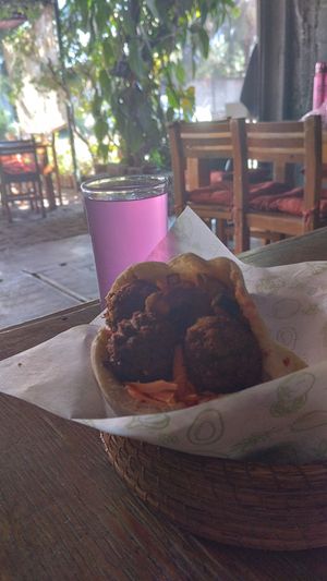 Falafel y agua de limón con bugambilia. at Falafel Shalom in Tepoztlan