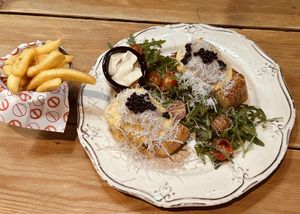 Classic Benedict with fries  at Frutas Prohibidas in Madrid