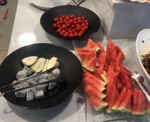 Offering fresh fruit 、soybean milk and tea drink... at Pǐn Lián SùShí 品莲素食 in Sanya