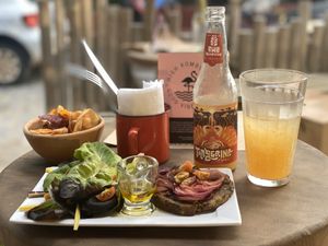 Shiitake Burger (sweet potato & shiitake), Chips(mix of sweet potatoes fried with coconut oil), organic salad. Mmm at Tao Chá in Trancoso