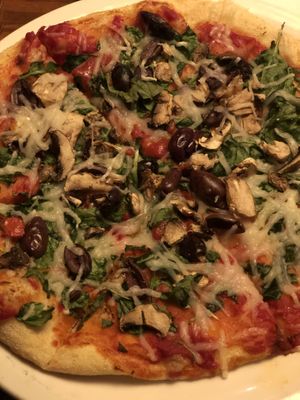 Daiya cheese pizza with mushrooms, spinach, and kalamata olives. at UNO Pizzeria in Hamilton