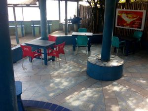 You can eat right over the ocean enjoying cool fresh air. at The Rising Phoenix in Accra