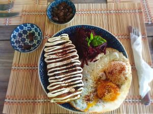 Traditional Costa Rican dish: ripe plantain dough filled with mashed beans and cheese at Café Coral in Cahuita