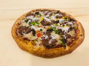 Vegan Gyro pizza & vegan tzatziki!!! at T-Mama's Gourmet in Aurora