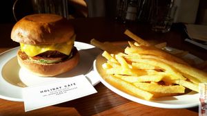 Burger with french fries at Holiday Vegan Diner in Paris