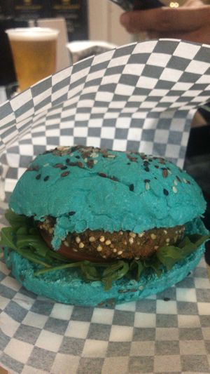 Quinoa burger with spirulina bread  at No Ponto in Nazare