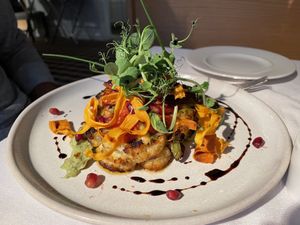 Cauliflower steak with cheese or vegan   at Fellinis in Ambleside