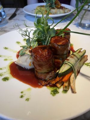 Courgette ‘cannelloni’ stuffed with cashew & lentil nut roast and mashed potato 🤩  at Fellinis in Ambleside