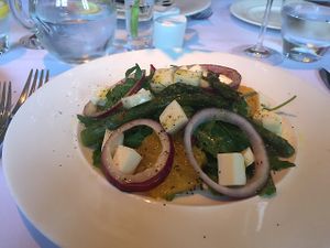 Asparagus, orange and red onion salad starter with vegan cheese at Fellinis in Ambleside