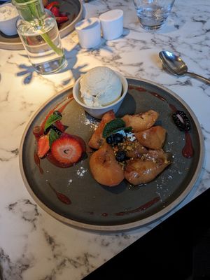 Roasted peaches with thyme and vegan ice cream. Really good! at Fellinis in Ambleside