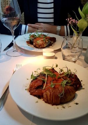 Portobello mushrooms and Lentil kebab dishes with potatoes  at Fellinis in Ambleside