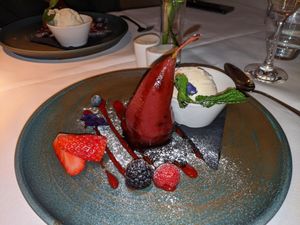 Spiced poached pear with vegan ice cream at Fellinis in Ambleside