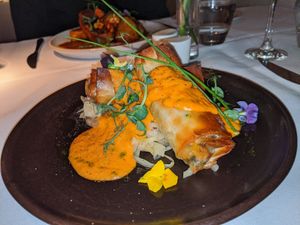 Vegan apricot and leek rolls with fried cabbage at Fellinis in Ambleside