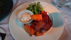 Roasted Sweet potatoes and vegan white sauce at Fellinis in Ambleside