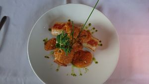 Mixed veggies in filos pastry, red pepper sauce and pumpkin seeds at Fellinis in Ambleside