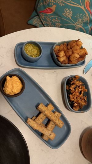 Polenta fries, potato bravas, chard and onions  at Glas Restaurant in Dublin