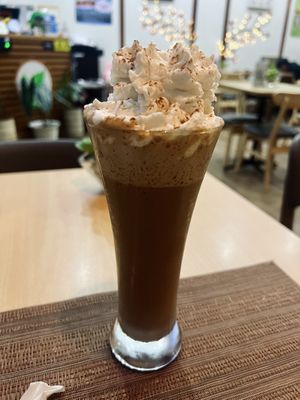 Delicious frozen coffee with vegan whipped cream   at iVegan in Makati