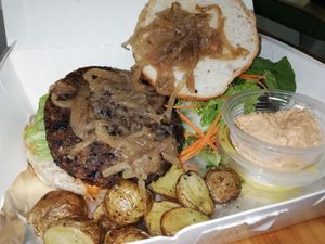Black bean burger. The best creamy smoky dip for the bread and potatoes. at iVegan in Makati