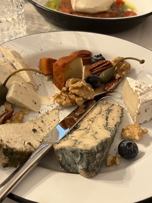 Plate with 5 types of cheese 😍  at Pepper & Ginny - Vegane Veinkost in Vienna