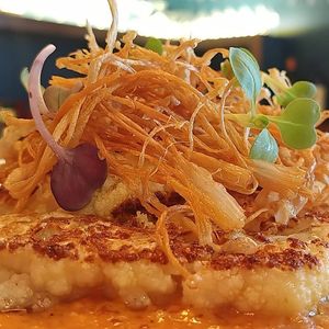 Cauliflower Steak

cauliflower roasted in a pan garnished with mushroom fried in romesco sauce at Pasta Ciao in Busan