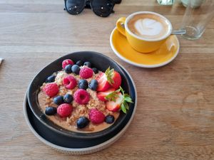 Overnight oats and a coconut flat white at Wolfox in Brighton