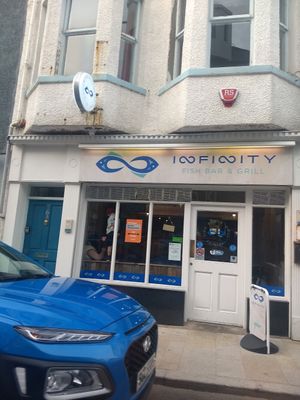 Shop front at Infinity Fish Bar & Grill in Portrush