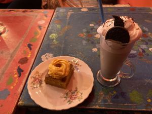Orange & passionfruit cake + Oreo milkshake - all vegan  at Plush in York