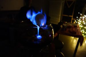 Always impressive: making mulled wine with a rum-soaked sugarloaf lit above it ("Feuerzangenbowle") at SaarVeggies in Saarbrucken