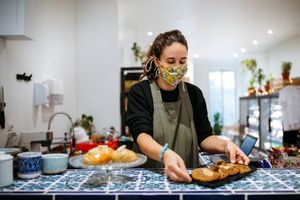 Yasmine getting the cakes ready at Cabane du 12 in Nice