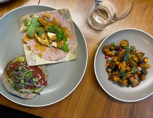 Beet tartare taco, cauliflower taco, and seasonal smoked squash salad. at Nixta Taqueria in Austin