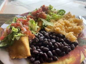 2 vegan empanadas with beans and rice   at AltaVita Restaurant in Idaho Falls