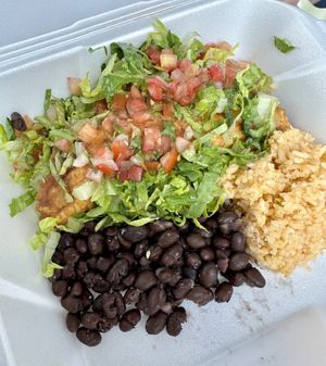 Empanada with beans and rice  at AltaVita Restaurant in Idaho Falls
