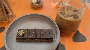 Oat iced latte + "snickers" bar at Wild Souls in Athens