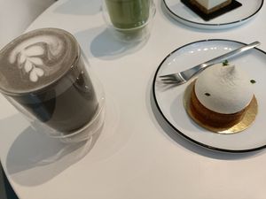 Black sesame and Adzuki bean latte, citrus Tarte. at Soi & Co in Berlin