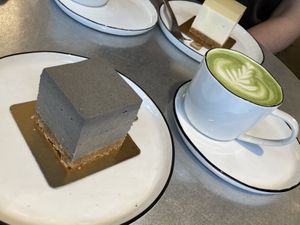 Sesam Tofu cheesecake and a matcha cappuccino (yuzu cheesecake in the back)  at Soi & Co in Berlin