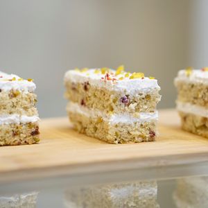 Pistacho cake with red berries and soy yogurt cream at Soi & Co in Berlin