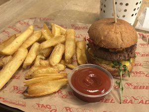 Beyond burger with fries  at Burger Market in Budapest
