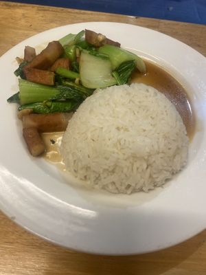 Crispy pork with Chinese broccoli   at Madame K's Vegan- CBD in Melbourne