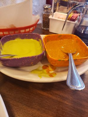 That orange salsa is hot and tasty !!! at Marla Restaurant in San Antonio