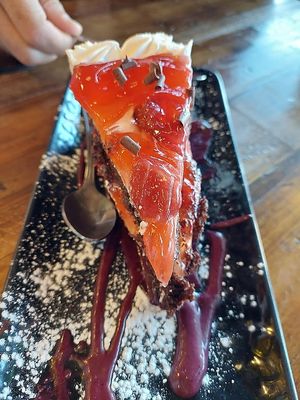 Strawberry chocolate cake, very large slice! at Red Lentil in Watertown