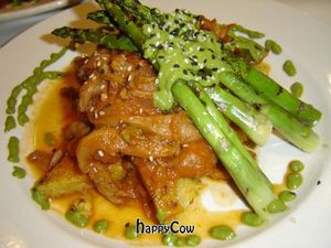 Butternut squash polenta - Grilled polenta, oyster mushroom ragout, warmed sesame asparagus drizzled with cilantro sunflower seed pesto at Red Lentil in Watertown