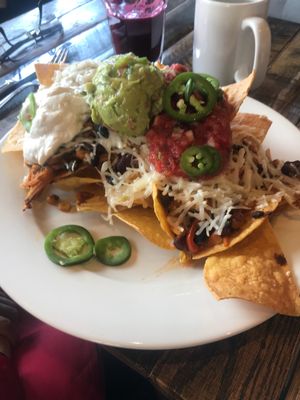 Nachos with Vegan cheese + sour cream at Red Lentil in Watertown
