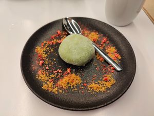 I am not a big fan but It was woth the try. This is the "rice cake" with matcha flavour. at Tokumaru in Tartu