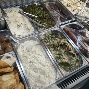 Vegan options: hummus, tabbouleh, aubergine, spinach beignet (fatayer) at Aux Vieux Cèdres in Paris